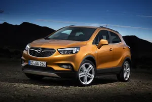 Opel Mokka Cruising On A Beautiful Country Road Wallpaper