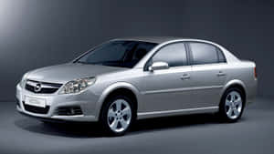 Opel Vectra Speeding On A Highway Wallpaper