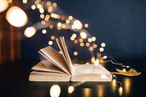 Open Book Yellow Bokeh Hd Light Wallpaper