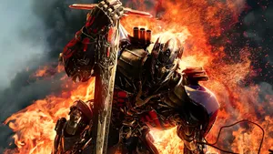 Optimus Prime In Fiery Battle Wallpaper