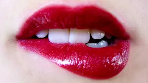 Oral Biting Red Lips Wallpaper