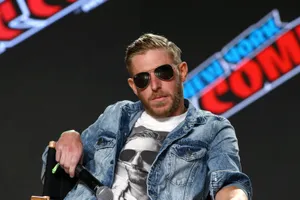 Orange Cassidy At Ny Comic-con In His Signature Sunglasses Wallpaper