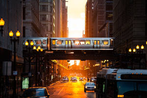 Orange City Train On Road Wallpaper