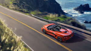 Orange Corvette C8 Convertible Coastal Drive Wallpaper
