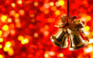 Orange Glimmer Christmas Bells Wallpaper