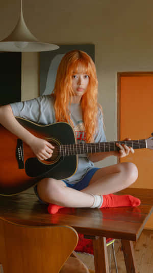 Orange Haired Girl Playing Guitar Wallpaper