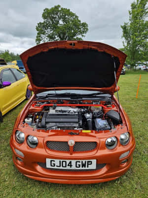 Orange M G Car Engine Show Wallpaper