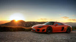 Orange Noble M600 And Sunset Wallpaper