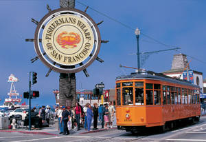 Orange Tram By Fishermans Wharf Sign Wallpaper