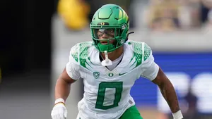 Oregon Football Playerin Action Wallpaper