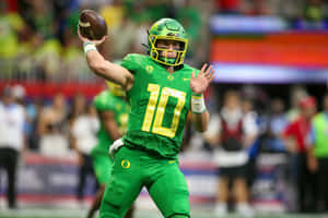 Oregon Quarterback Throwing Football Wallpaper