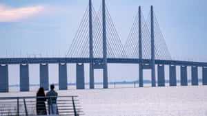 Oresund Bridge Romantic Ocean View Couple Wallpaper