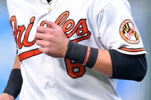 Orioles Player Adjusting Jersey Wallpaper