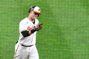 Orioles Player Celebrating On Field Wallpaper