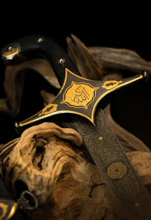 Ornate Islamic Dagger Artistry Wallpaper