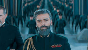 Oscar Isaac In His Notable Military Role Wallpaper