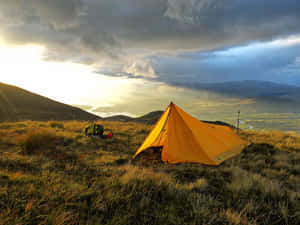 Outdoor Camping Under The Starlit Sky Wallpaper