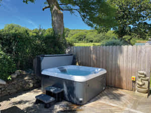 Outdoor Hot Tub Sunny Backyard Setting.jpg Wallpaper