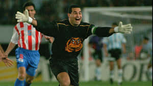 Overjoyed Paraguayan Footballer Jose Luis Chilavert Medium Angle Shot Wallpaper