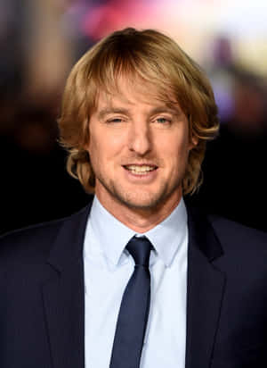 Owen Wilson Enjoying A Day At The Park Wallpaper