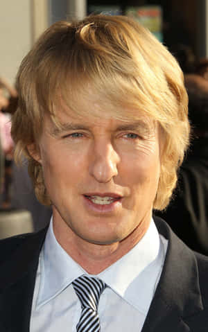 Owen Wilson Poses With A Relaxed Smile Wallpaper