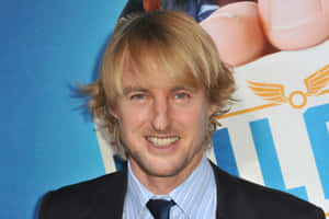 Owen Wilson Smirks For The Camera Wallpaper