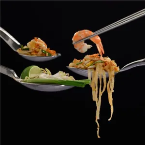 Pad Thai Ingredients On Spoons And Chopsticks Wallpaper