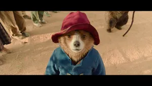 Paddington Bear In Blue Coat Wallpaper