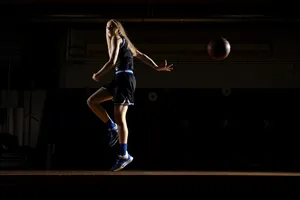 Paige Bueckers Basketball Action Wallpaper