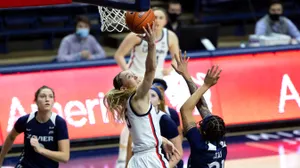 Paige Bueckers Basketball Action Wallpaper