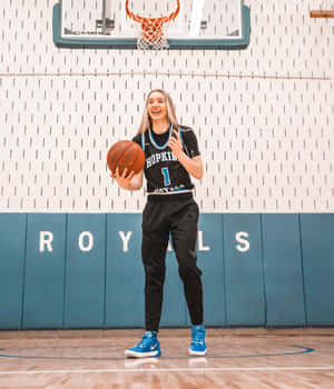 Paige Bueckers Basketball Star Wallpaper