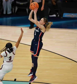 Paige Bueckers Shooting Jump Shot Wallpaper
