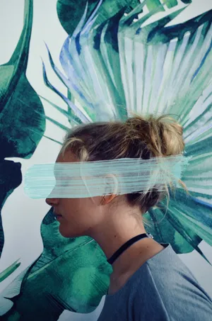 Paint Passing Over A Girl's Face Wallpaper