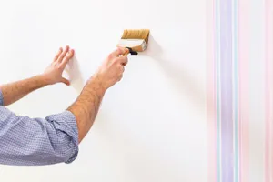 Painting Wall With Brush.jpg Wallpaper
