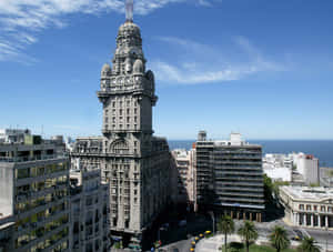 Palacio Salvo Surrounded By Buildings Wallpaper