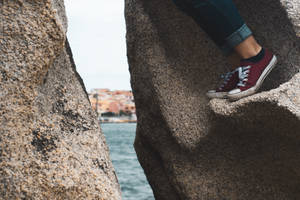 Palau Woman Stepping On Rock Wallpaper