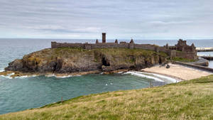 Panoramic View Of The Stunning Isle Of Mann Featuring St. Patrick's Isle Wallpaper