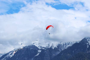 Paragliding Mid-air Shot Wallpaper