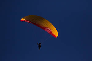 Paragliding Under Night Sky Wallpaper