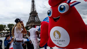 Paris2024 Olympics Mascot Eiffel Tower Wallpaper