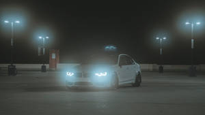 Parked Bmw M Headlights On Wallpaper