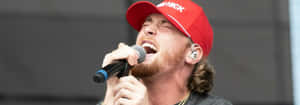 Passionate Country Singer Performance Wallpaper