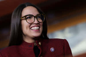 Passionate Politician Alexandria Ocasio-cortez In Maroon Outfit Wallpaper