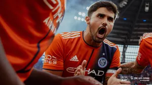 Passionate Soccer Player Motivating Team Wallpaper