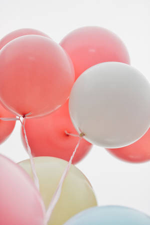 Pastel Balloons At White Background Wallpaper