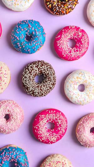 Pastel Phone Colored Donuts Wallpaper