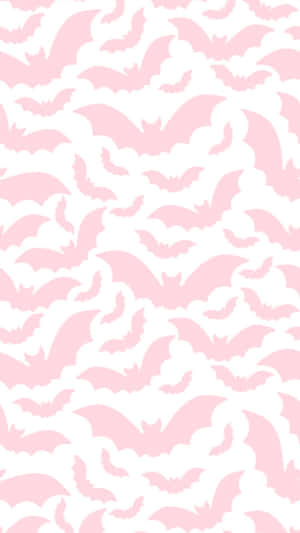 Pastel Pink Bat Pattern Halloween Wallpaper