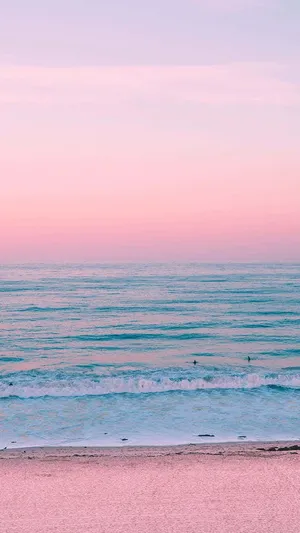 Pastel Sunset Beach Surfers Wallpaper