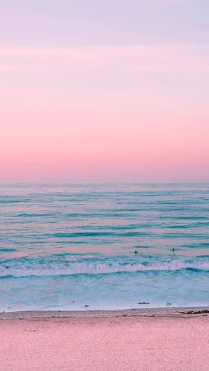 Pastel Sunset Beach Surfers.jpg Wallpaper
