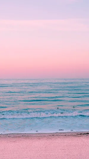 Pastel Sunset Surfers Beach Wallpaper